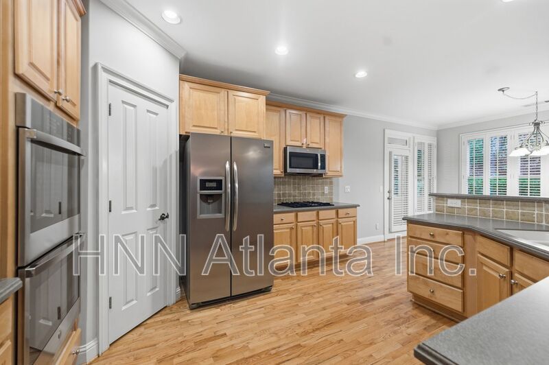 Elegant Brookhaven 4/4 Home with Space to Work, Entertain, and Unwind property image