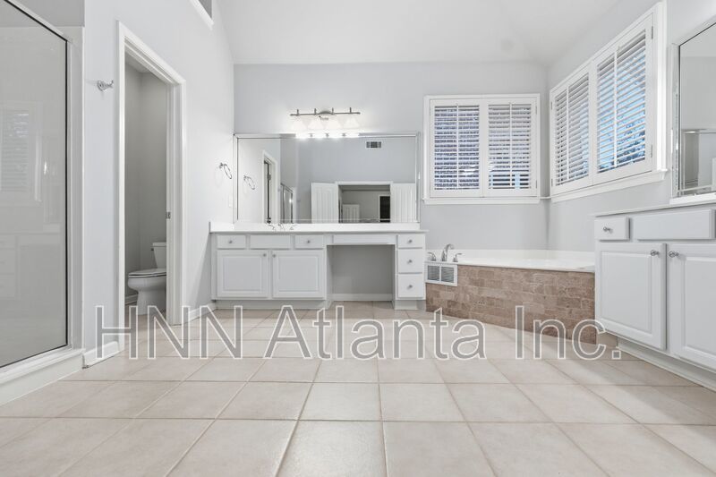 Elegant Brookhaven 4/4 Home with Space to Work, Entertain, and Unwind property image