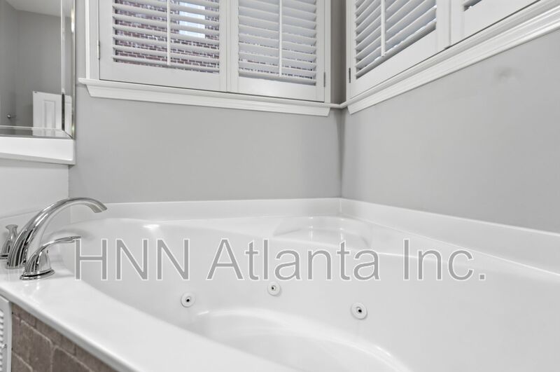 Elegant Brookhaven 4/4 Home with Space to Work, Entertain, and Unwind property image