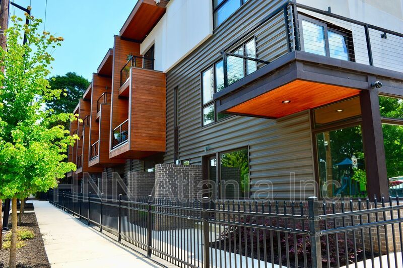 50% OFF APPLICATION FEE! Sleek 2BR Townhome-Style Condo with Rooftop Deck property image