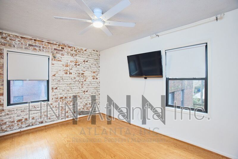 Bright Top-Floor 2/1 Condo in Prime Midtown property image