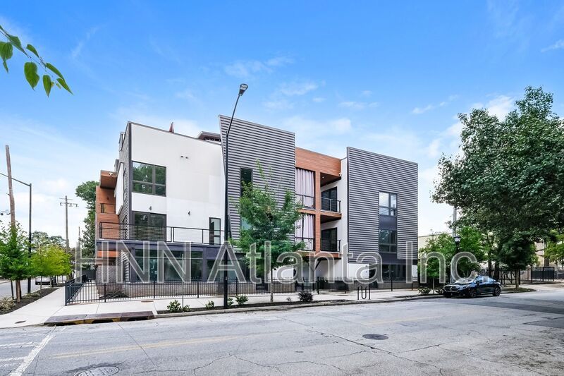 50% OFF APPLICATION FEE! Sleek 2BR Townhome-Style Condo with Rooftop Deck property image
