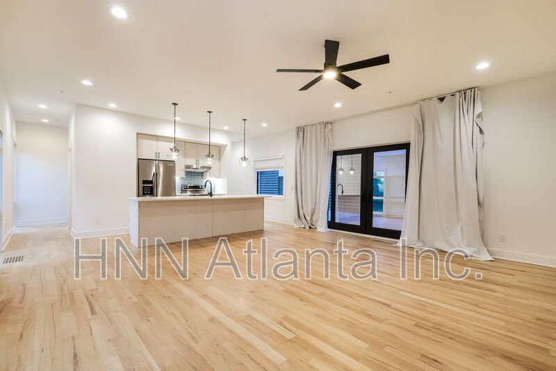 50% OFF APPLICATION FEE! Sleek 2BR Townhome-Style Condo with Rooftop Deck property image