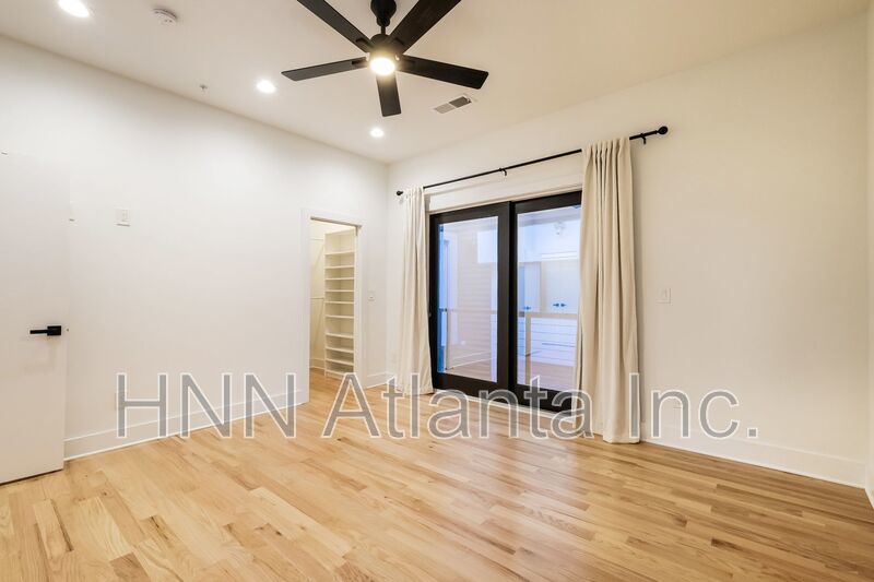 50% OFF APPLICATION FEE! Sleek 2BR Townhome-Style Condo with Rooftop Deck property image