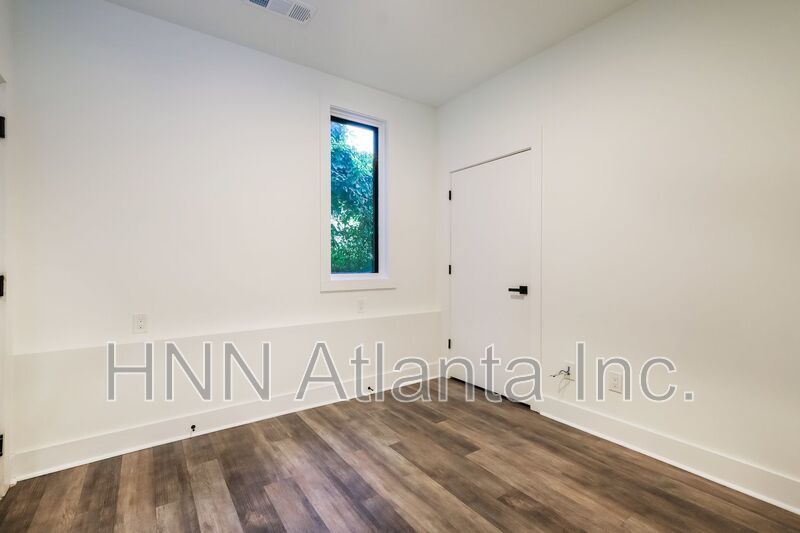 50% OFF APPLICATION FEE! Sleek 2BR Townhome-Style Condo with Rooftop Deck property image
